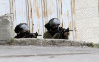 Israeli soldiers seen alert with rifles in their hands ready...